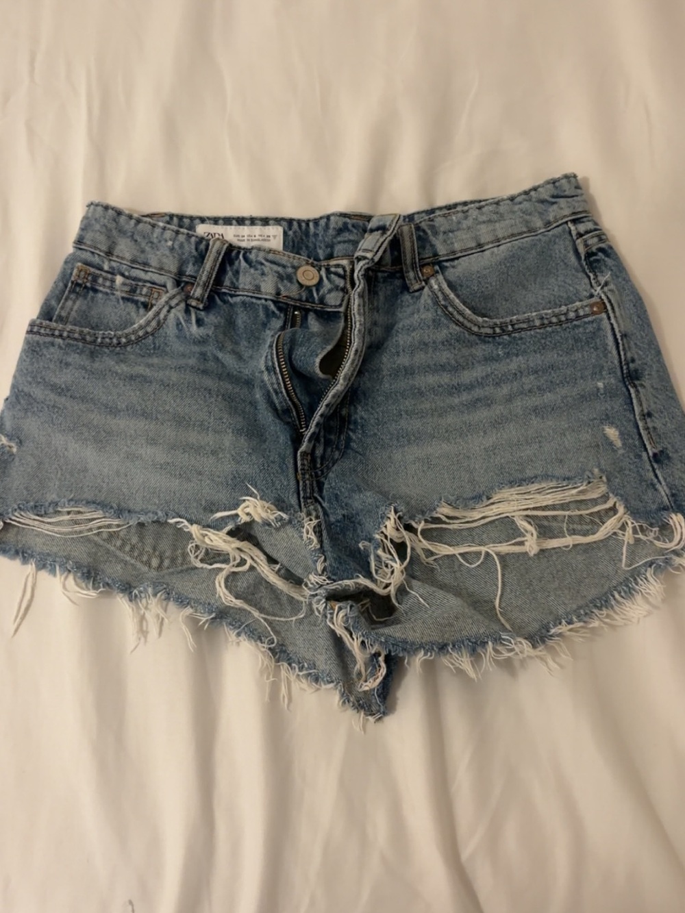 Zara Light Blue Distressed Denim Cutoff Shorts